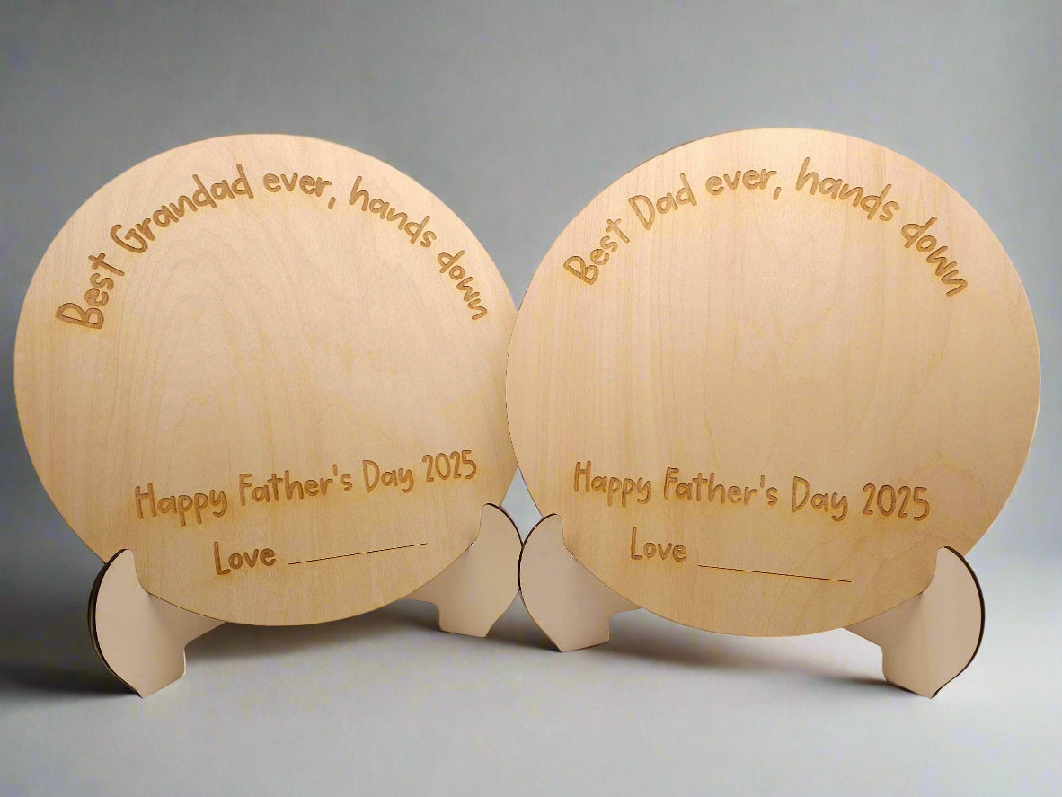 Two wooden plaques with engraved text on a light background