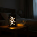 Decorative light panel with floral designs and 'Faith Hope Love' text on a dark background