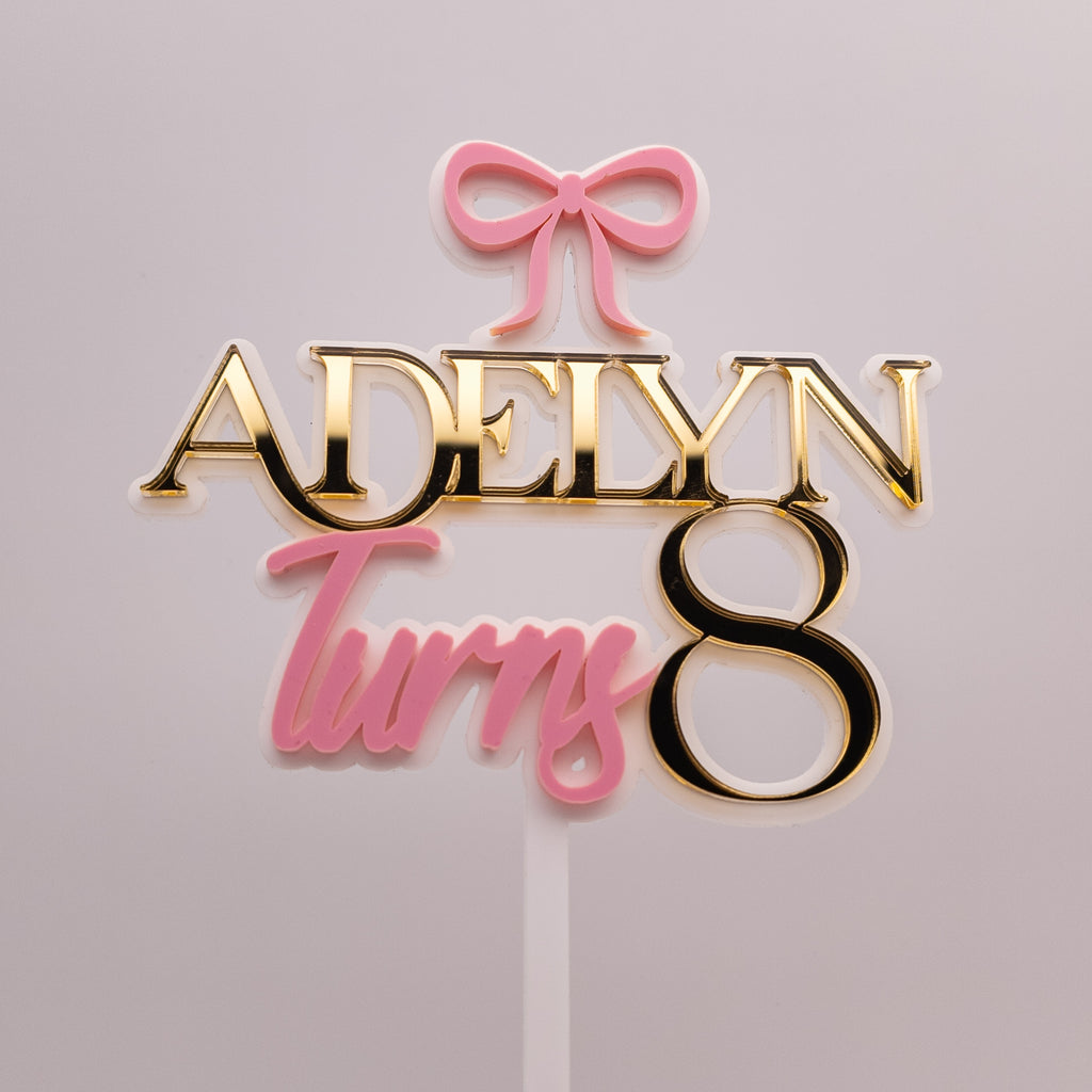 Custom Name Age Cake Topper – Bow Design (Pink & Gold Mirror Acrylic)