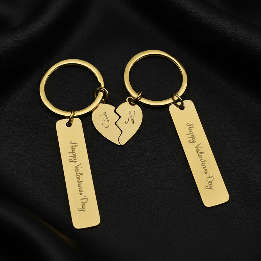 Gold keychain with 'Happy Valentine's Day' tags on a gray background