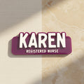 Purple nameplate with 'KAREN REGISTERED NURSE' text on a white background