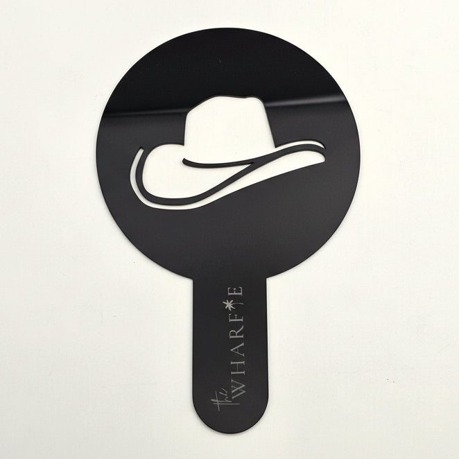 Black coffee stencil with white cowboy hat design 