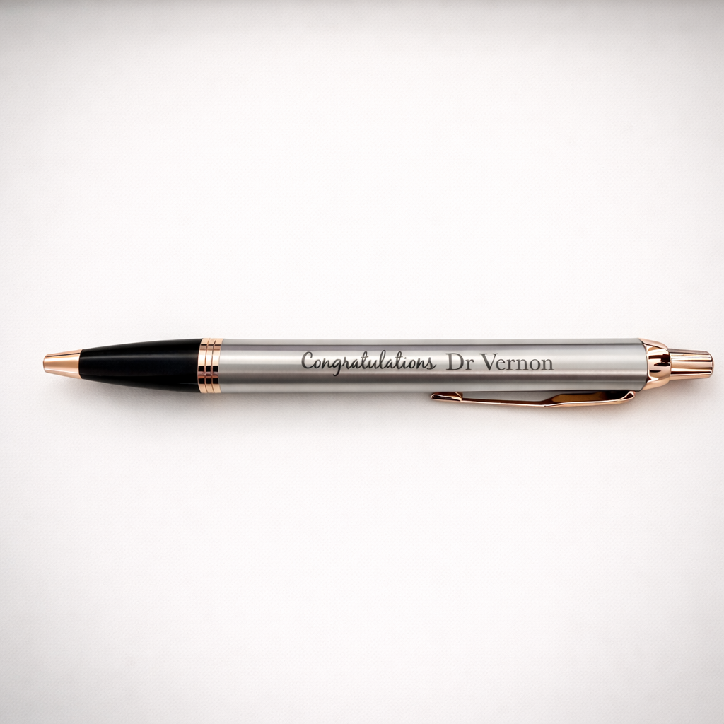 Pen with 'Congratulations Dr Vernon' engraving on a white background