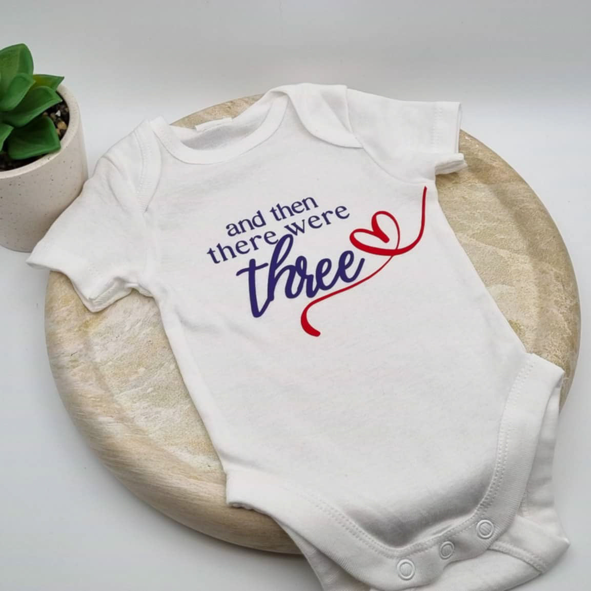 “And Then There Were Three” Baby Onesie – Red & Navy