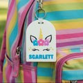 Keychain with unicorn design and 'Scarlett' text on a white background