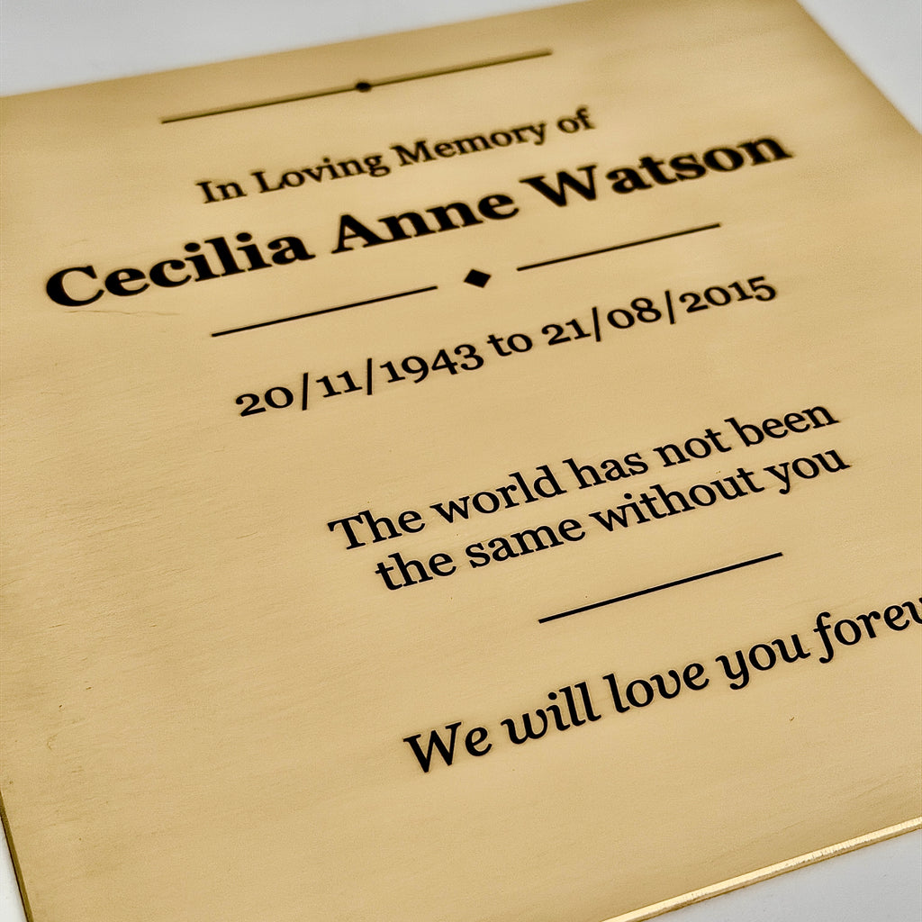 Memorial plaque for Cecilia Anne Watson with text and date details.