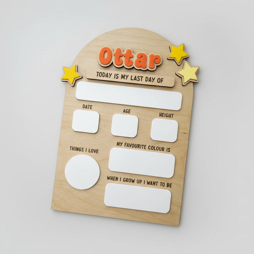 Wooden board with 'Ottar' branding and text for tracking a child's milestones on a black background.