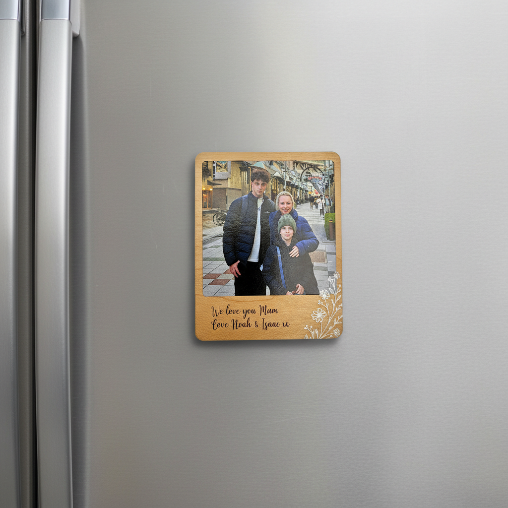 Wooden photo plaque with a family photo and engraved message on a white background