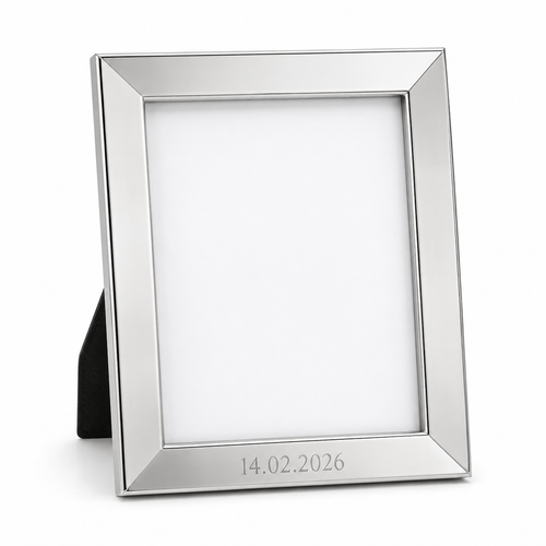 Silver picture frame with engraved date along the bottom