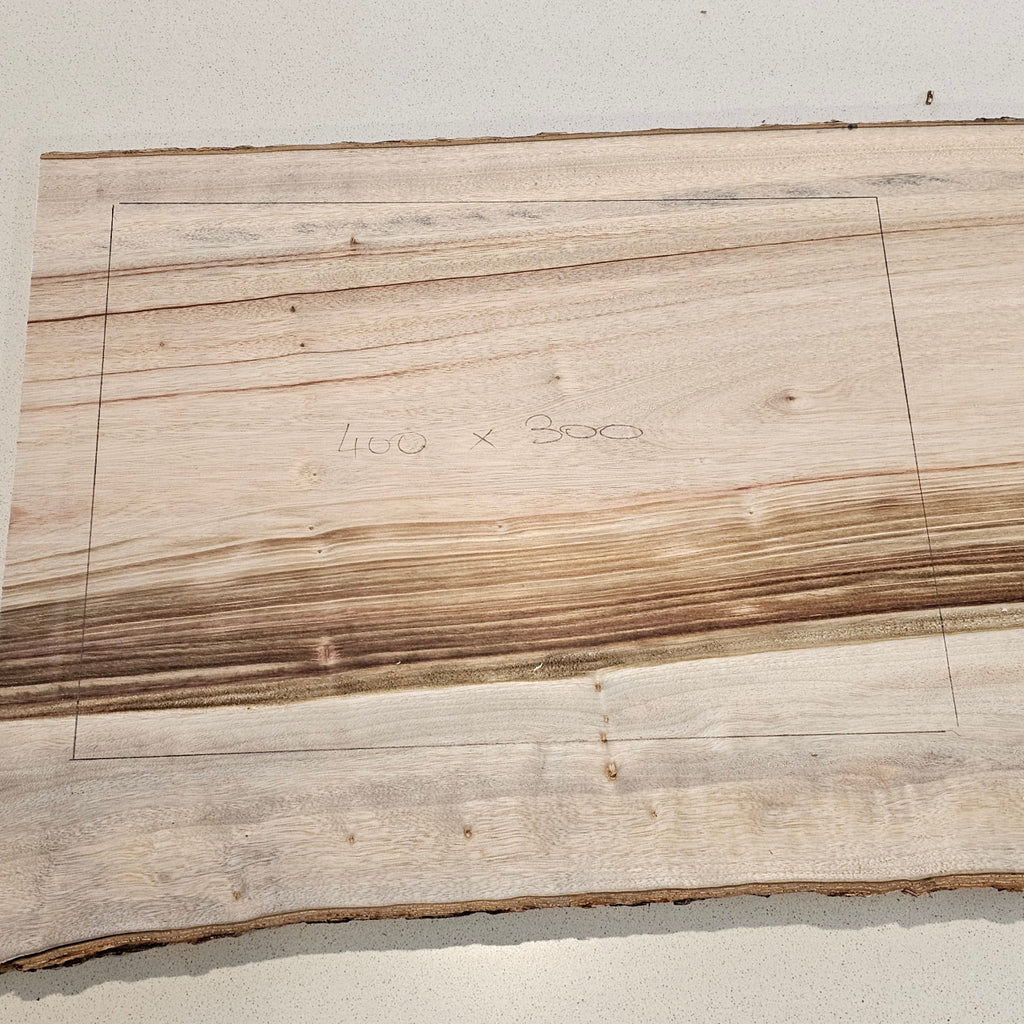 wooden slab ready to be made into a serving board