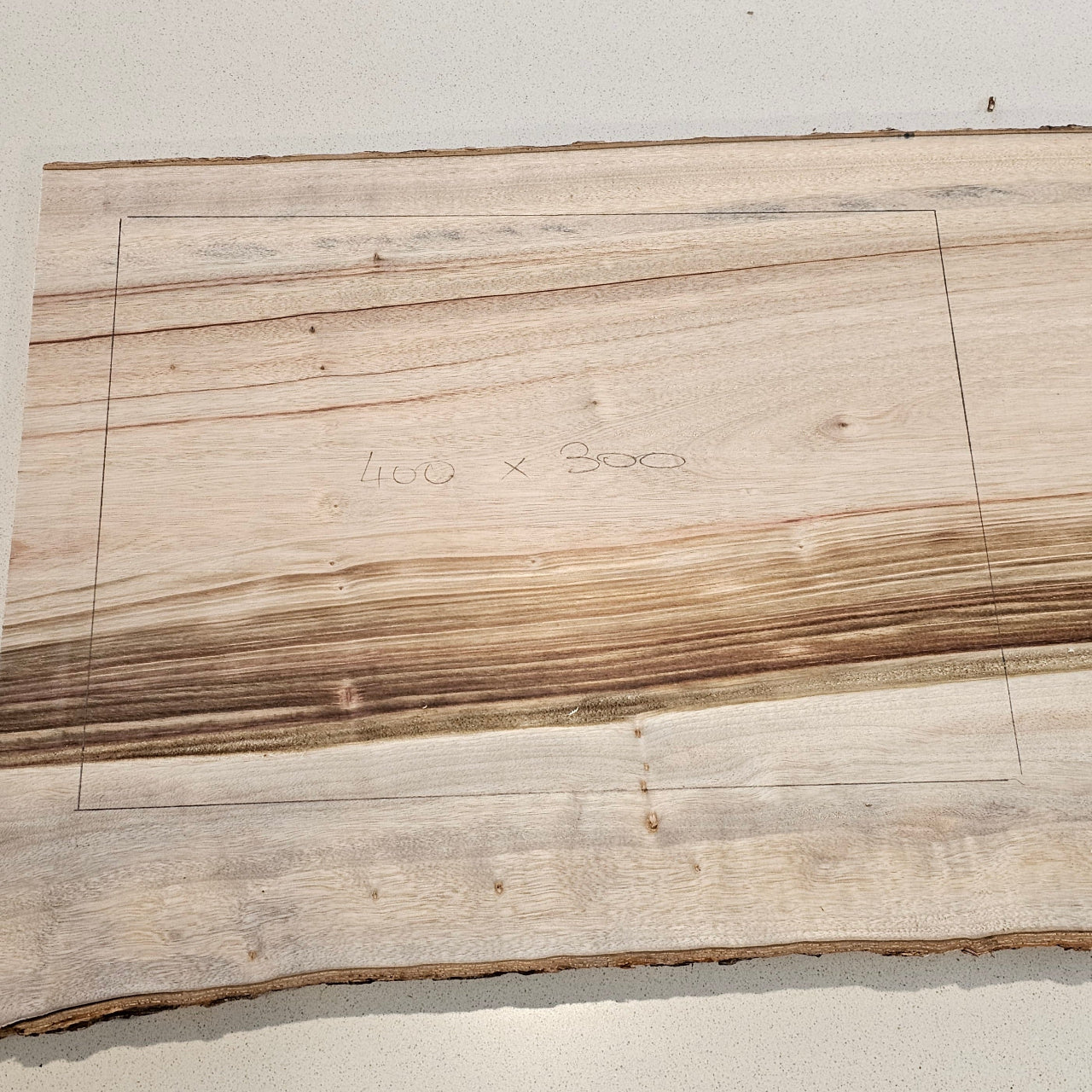 wooden slab ready to be made into a serving board
