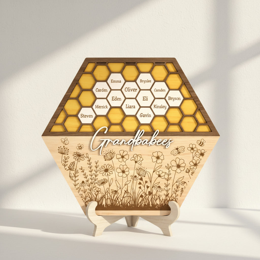 Hexagonal wooden display with honeycomb design and engraved names on a gray background