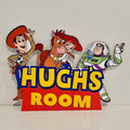 Personalised multilayer acrylic kids room door sign with a colourful custom name design