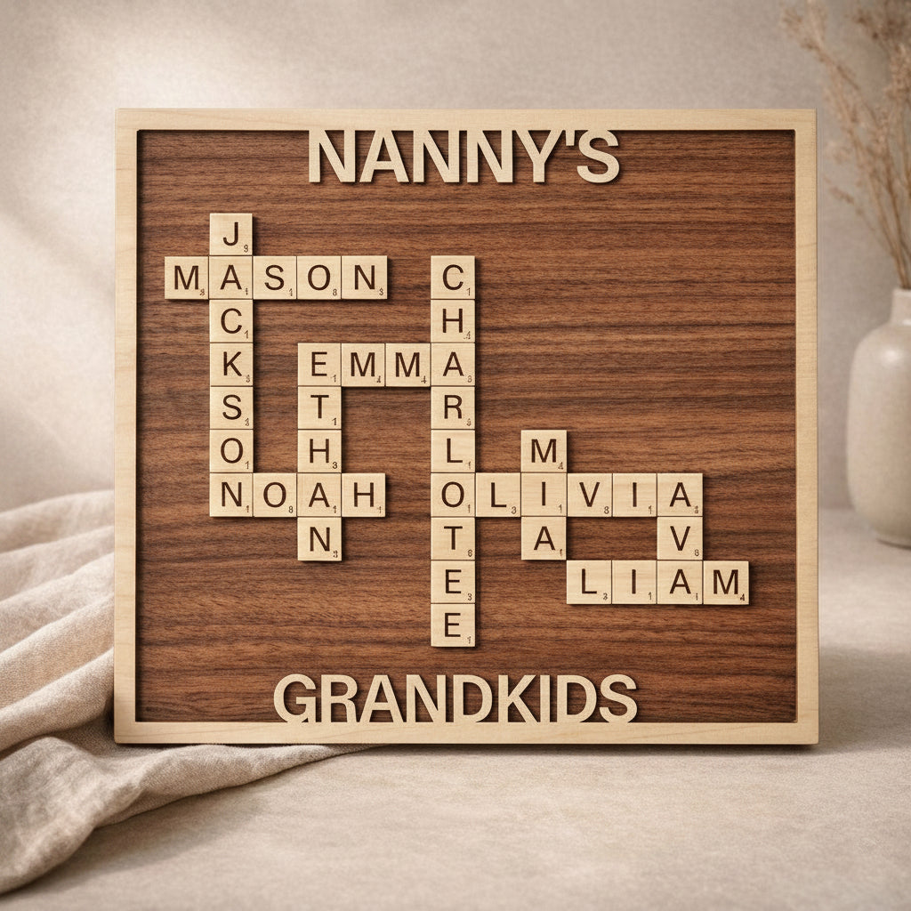 Wooden board with scrabble tiles spelling out names of grandchildren, framed by 'NANNY'S' and 'GRANDKIDS'.