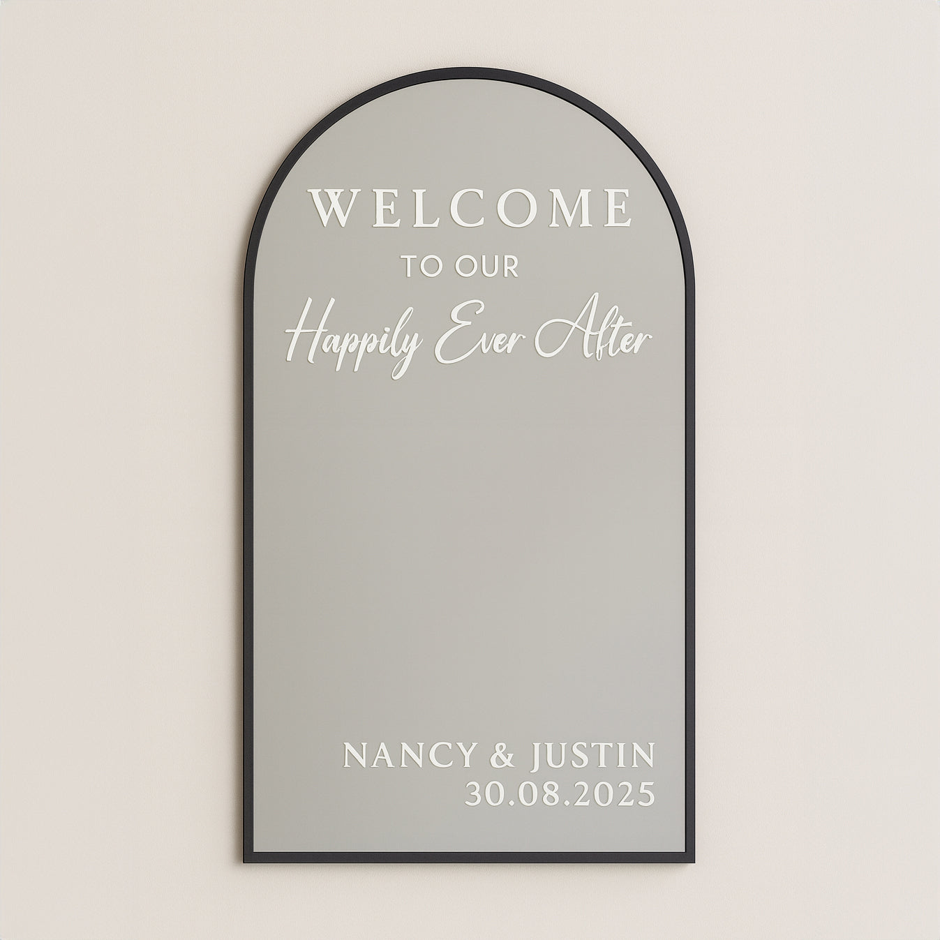 Decorative mirror with personalized text on a light gray background