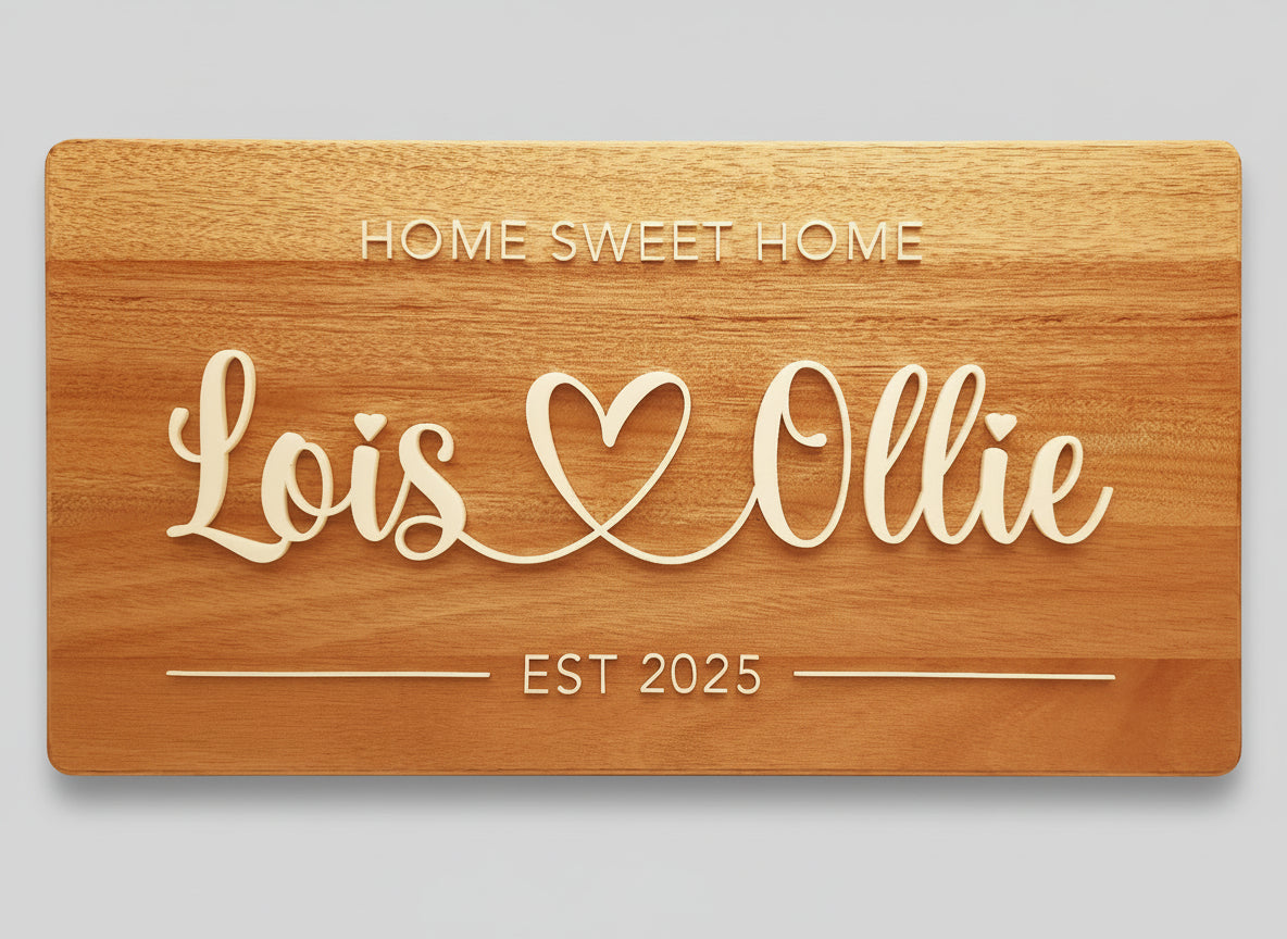 Wooden plaque with 'Home Sweet Home' and 'Lois Ollie' engraved on a beige background